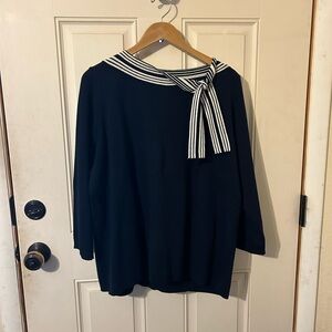 Used Good Condition. Navy and White Striped Bow Sweater